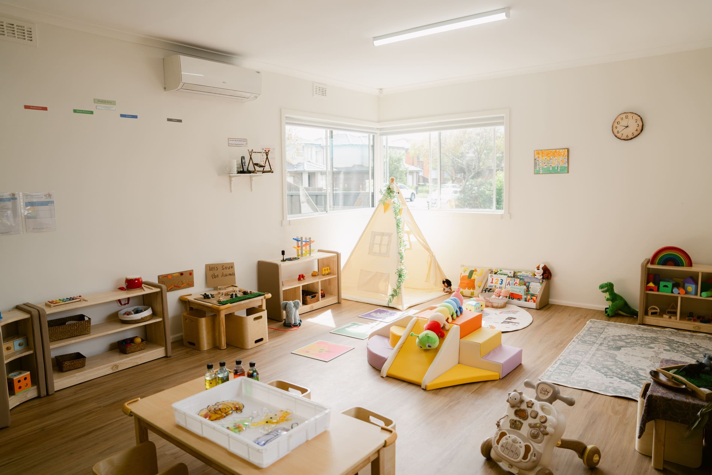 Interactive indoor play area with a cosy tent and interactive activities